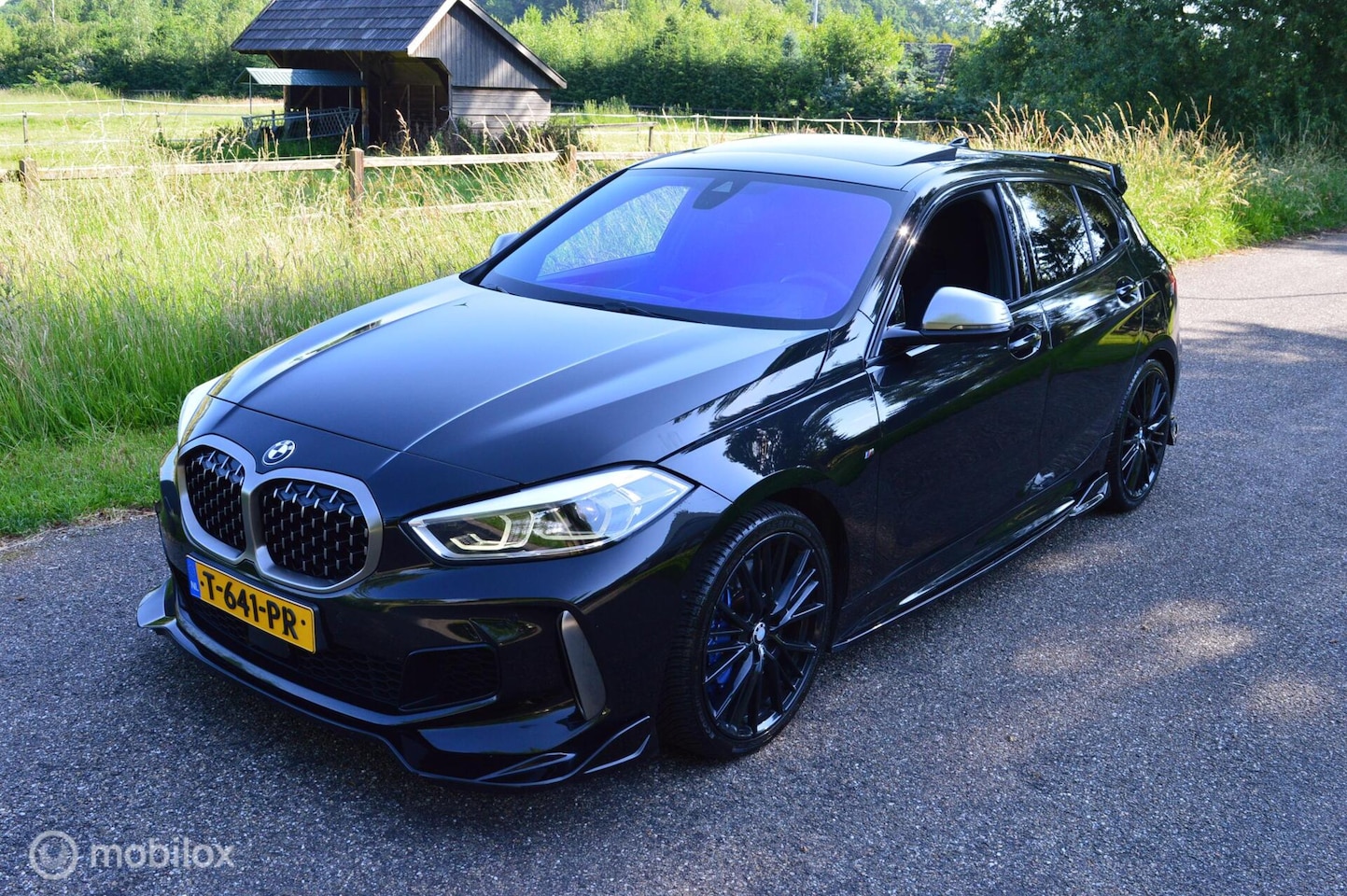 BMW 1-serie - M135i xDrive ACC / HUD/ Panorama / H&K / Camera - AutoWereld.nl