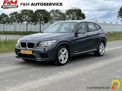 BMW X1 - sDrive20i High Executive Clima, cruise, stoelverwarming, pdc, trekhaak