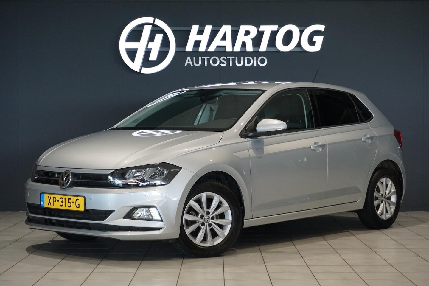 Volkswagen Polo - 1.0 TSI Highline DSG + NAVI / STOELVERWARMING / ACC - AutoWereld.nl