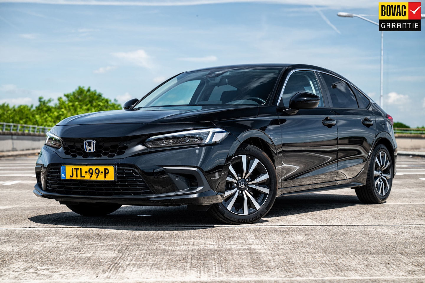 Honda Civic - 2.0 e:HEV Elegance | Airco/Clima | Adaptive Cruise Control | Stoelverwarming | Achteruitri - AutoWereld.nl
