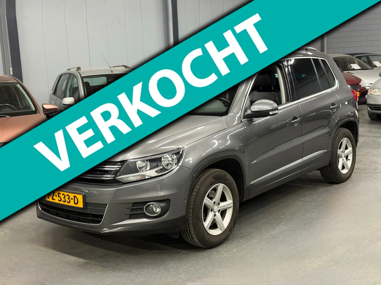 Volkswagen Tiguan - 1.4 TSI R-Line Edition PANO LEER PDC - AutoWereld.nl