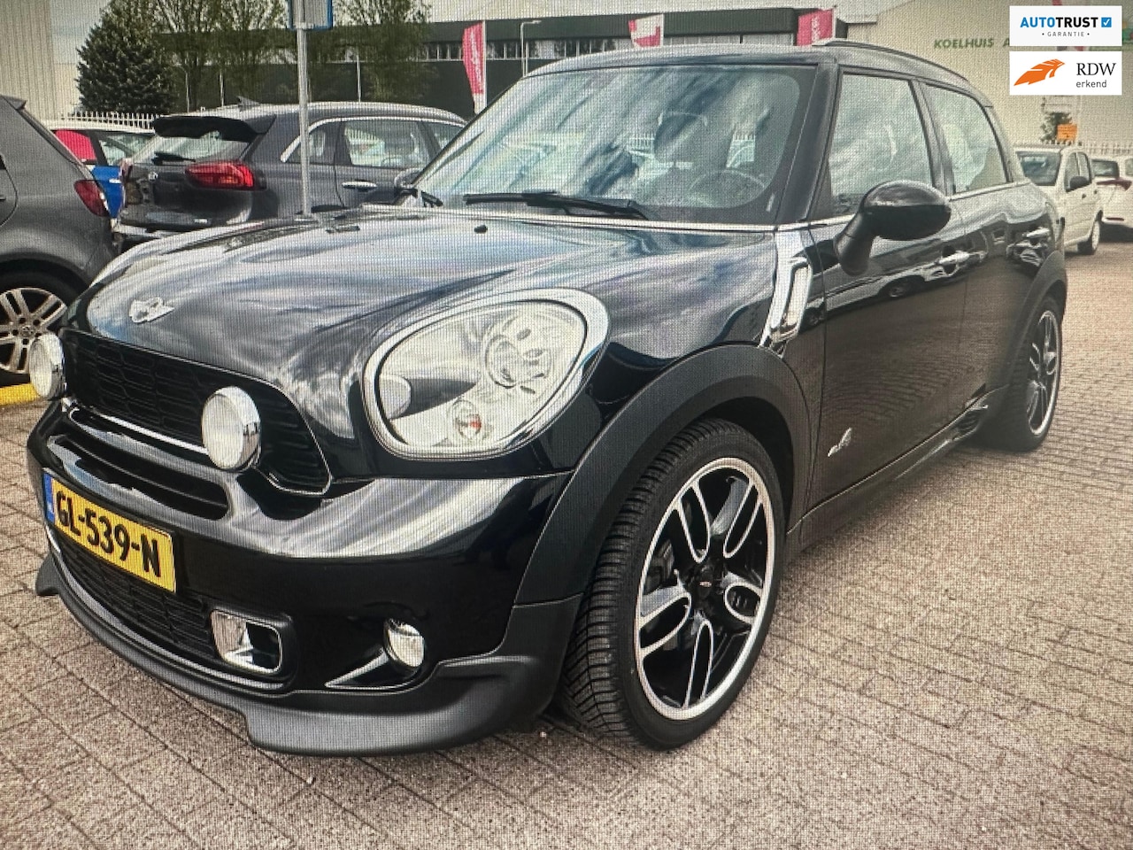 MINI Countryman - 1.6 Cooper S All4 /autom/JCW pakket/navi/pano/airco/nw-APK/LM-velgen/harmon-cardon/2 sleut - AutoWereld.nl