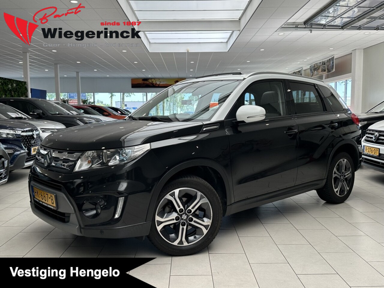 Suzuki Vitara - 1.6 High Executive [ TREKHAAK I PANORAMADAK I ALL-SEASON BANDEN] - AutoWereld.nl