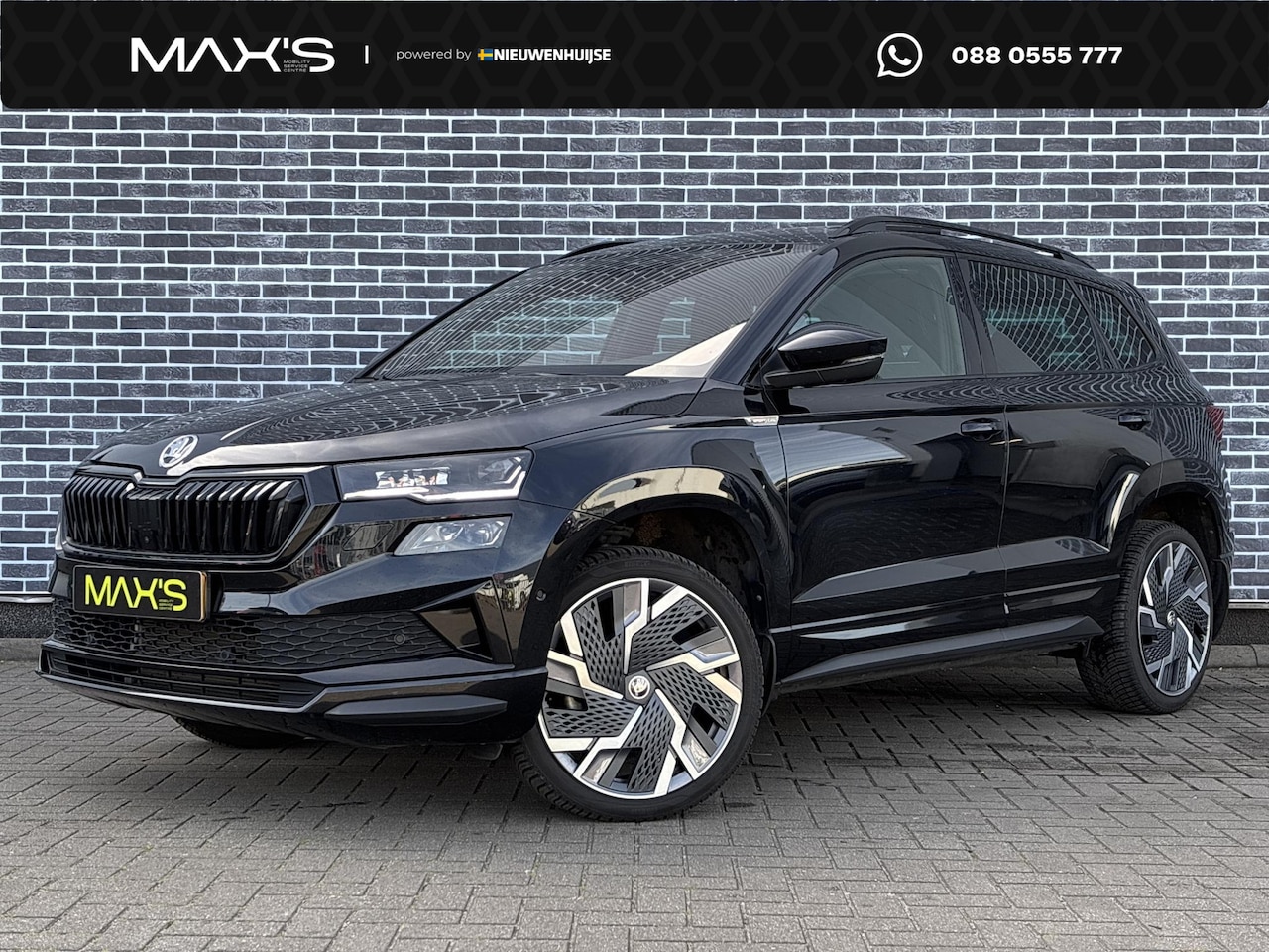Skoda Karoq - 1.5 TSI DSG Sportline Business | Trekhaak | 360 Graden Camera | Parkeersensoren | Panorama - AutoWereld.nl