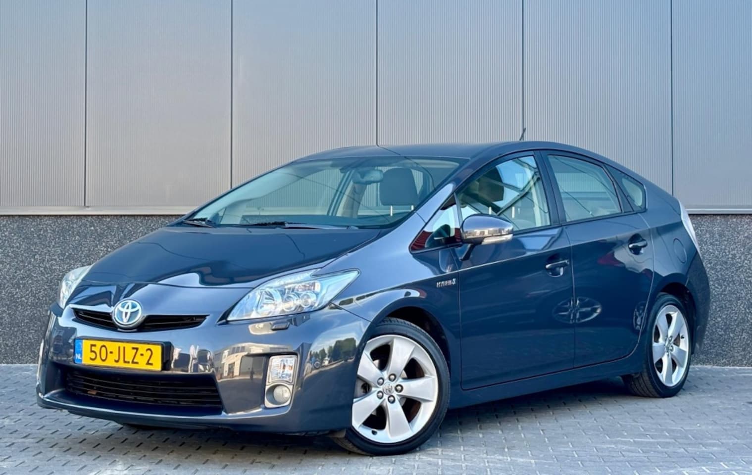 Toyota Prius - 1.8 Dynamic Clima | Navi | Head-up - AutoWereld.nl