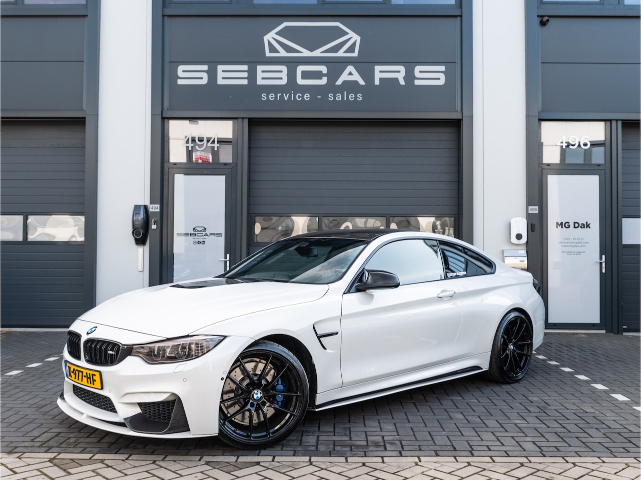 BMW M4 - Coupe 500PK, Carbon pakket, Carplay, M Performance Uitlaat Systeem, HARMAN/KARDON - AutoWereld.nl