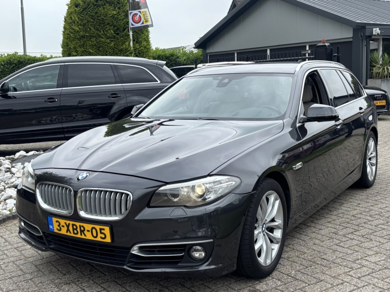 BMW 5-serie Touring - 550I V8 High Executive 2014 Facelift DVD - AutoWereld.nl