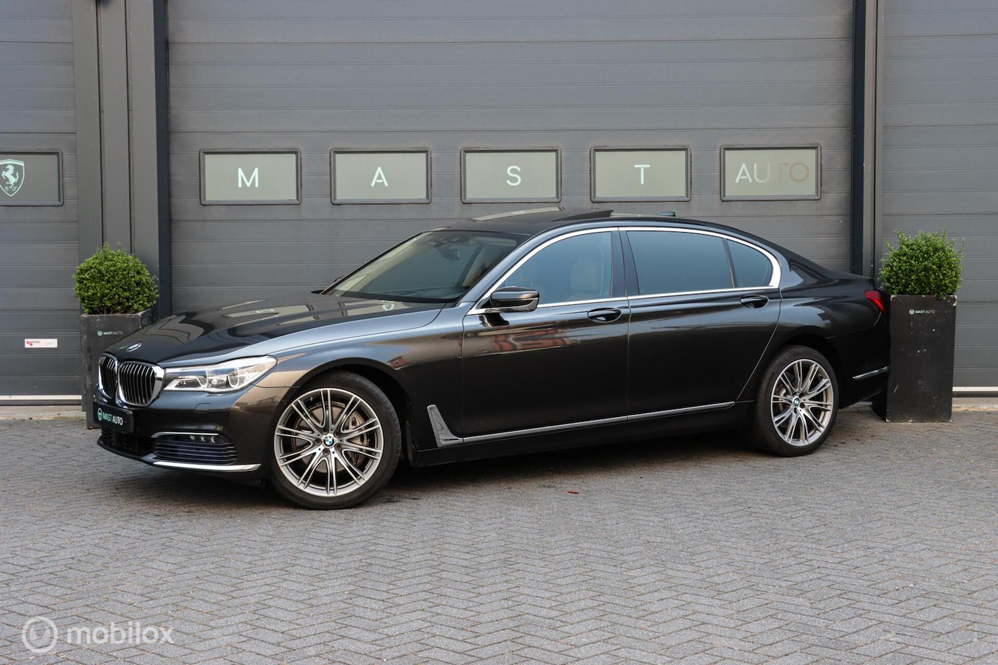 BMW 7-serie - 740Li High Executive|SKY-LOUNGE|B&W|HUD|ACC|REAR SEAT ENT. - AutoWereld.nl