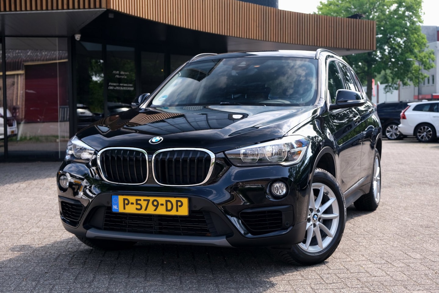 BMW X1 - SDrive18i Executive|Rijklaar!|Trekhaak|Stoelverwarming|Clima|Cruise|PDC - AutoWereld.nl