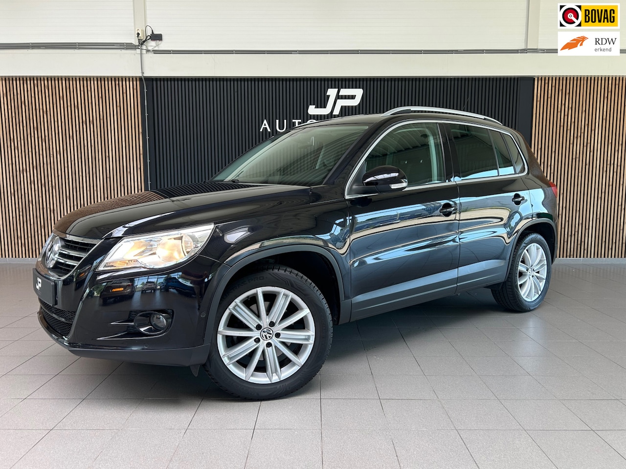Volkswagen Tiguan - 1.4 TSI Sport&Style TREKHAAK|NAVI|PDC|PARKEERHULP| - AutoWereld.nl