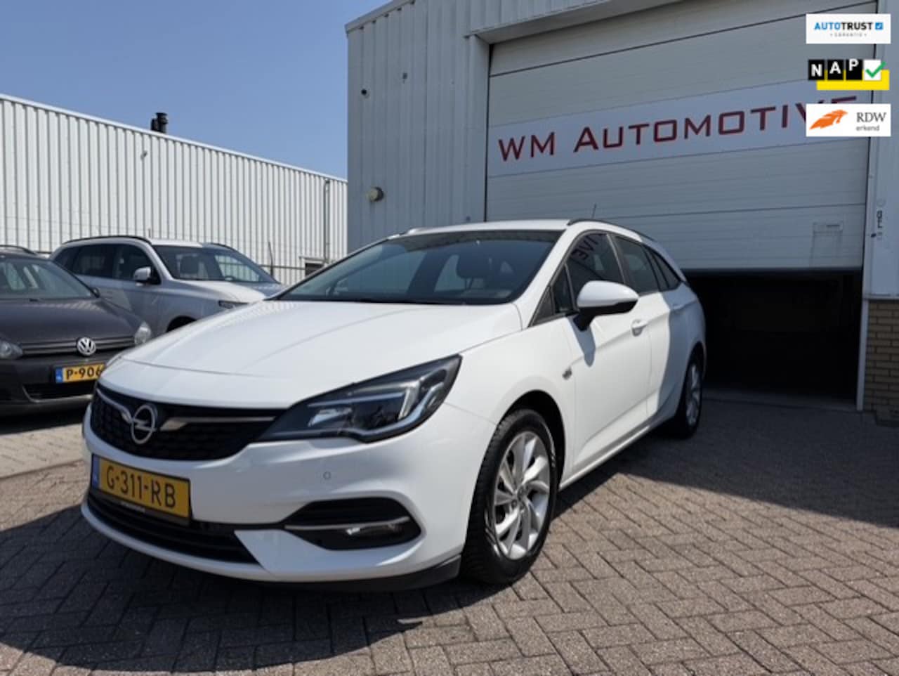 Opel Astra Sports Tourer - 1.2 Edition AIRCO NAVI - AutoWereld.nl