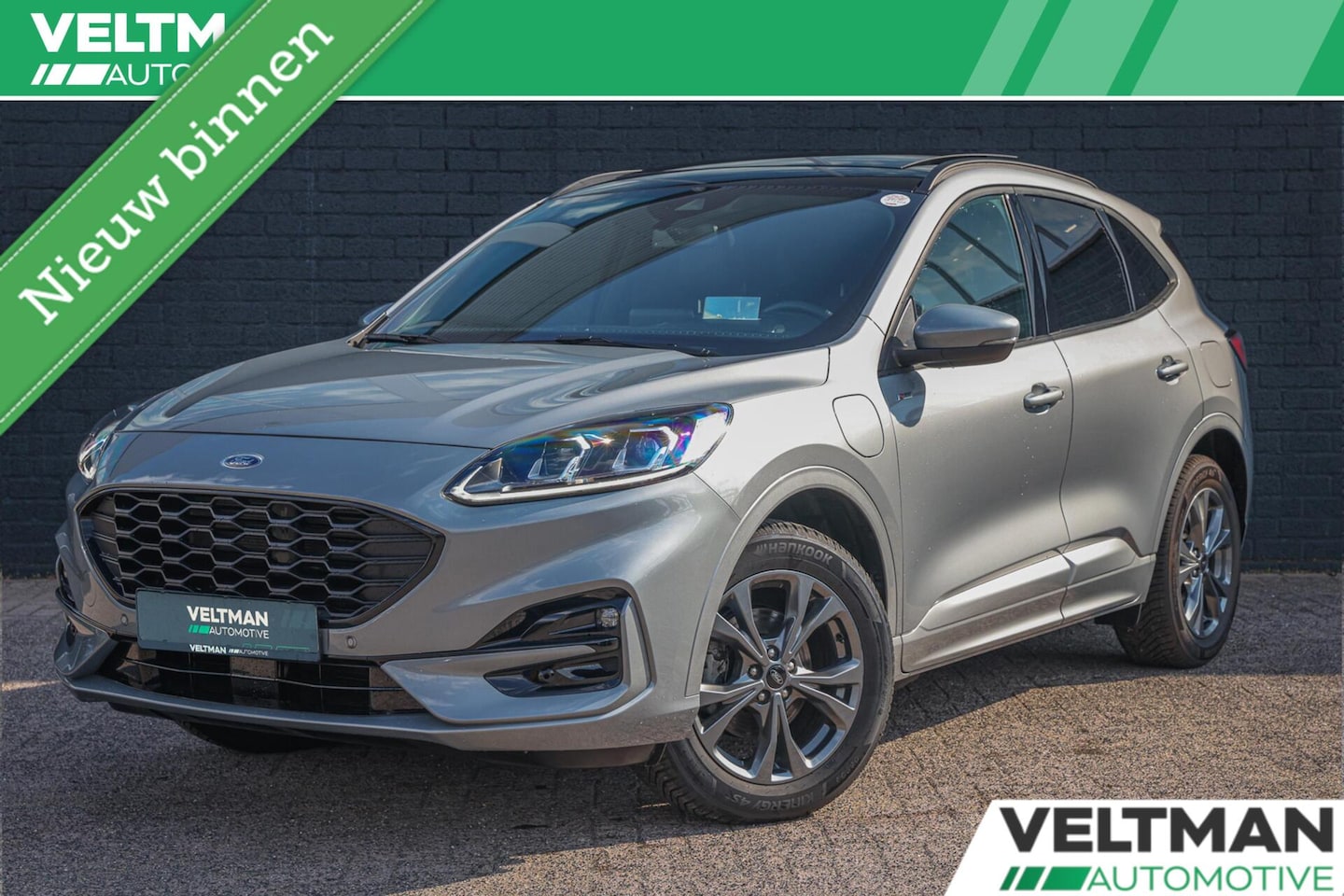 Ford Kuga - 2.5 PHEV ST-Line X PANO TREKHAAK ADAPTIVE CRUISE HEAD UP CAMERA STUURVERWARMING B&O - AutoWereld.nl