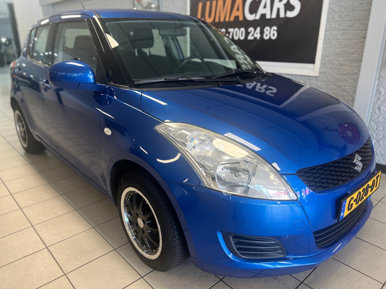 Suzuki Swift - 1.2 Comfort EASSS |Airco |5-deurs| Stoelverw.| - AutoWereld.nl