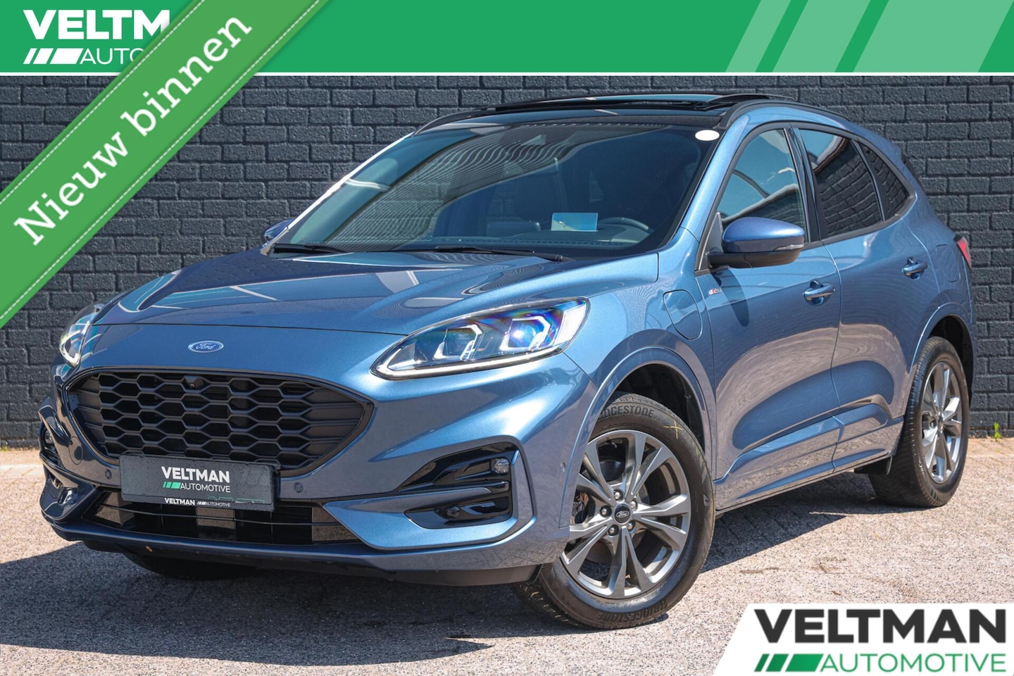 Ford Kuga - 2.5 PHEV ST-Line X PANO TREKHAAK ADAPTIVE CRUISE HEAD UP CAMERA STUURVERWARMING B&O - AutoWereld.nl