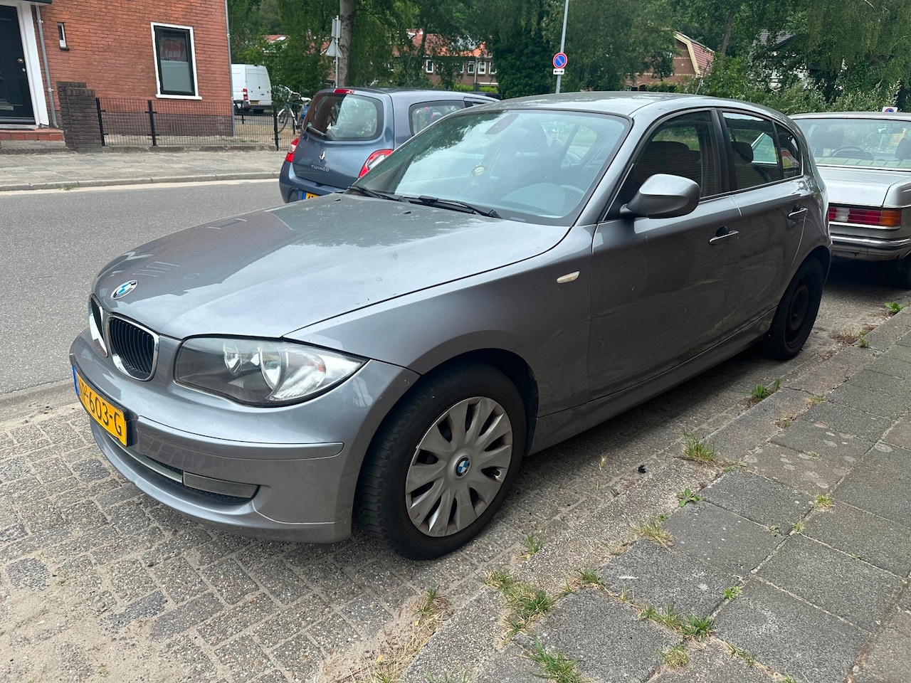 BMW 1-serie - 116i Business Line AIRCO FACELIFT (AUTO START NIET) - AutoWereld.nl