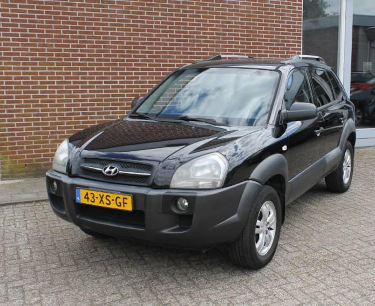Hyundai Tucson - 2.0 I 2WD Dynamic - AutoWereld.nl