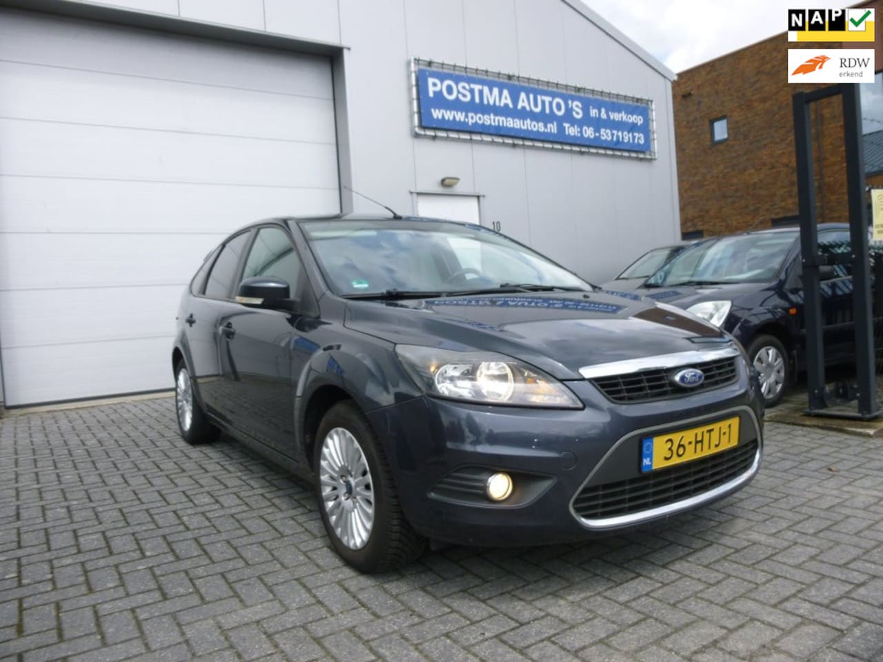 Ford Focus - 1.6 Titanium 1.6 Titanium, airco, trekhaak, boekjes aanwezig. - AutoWereld.nl