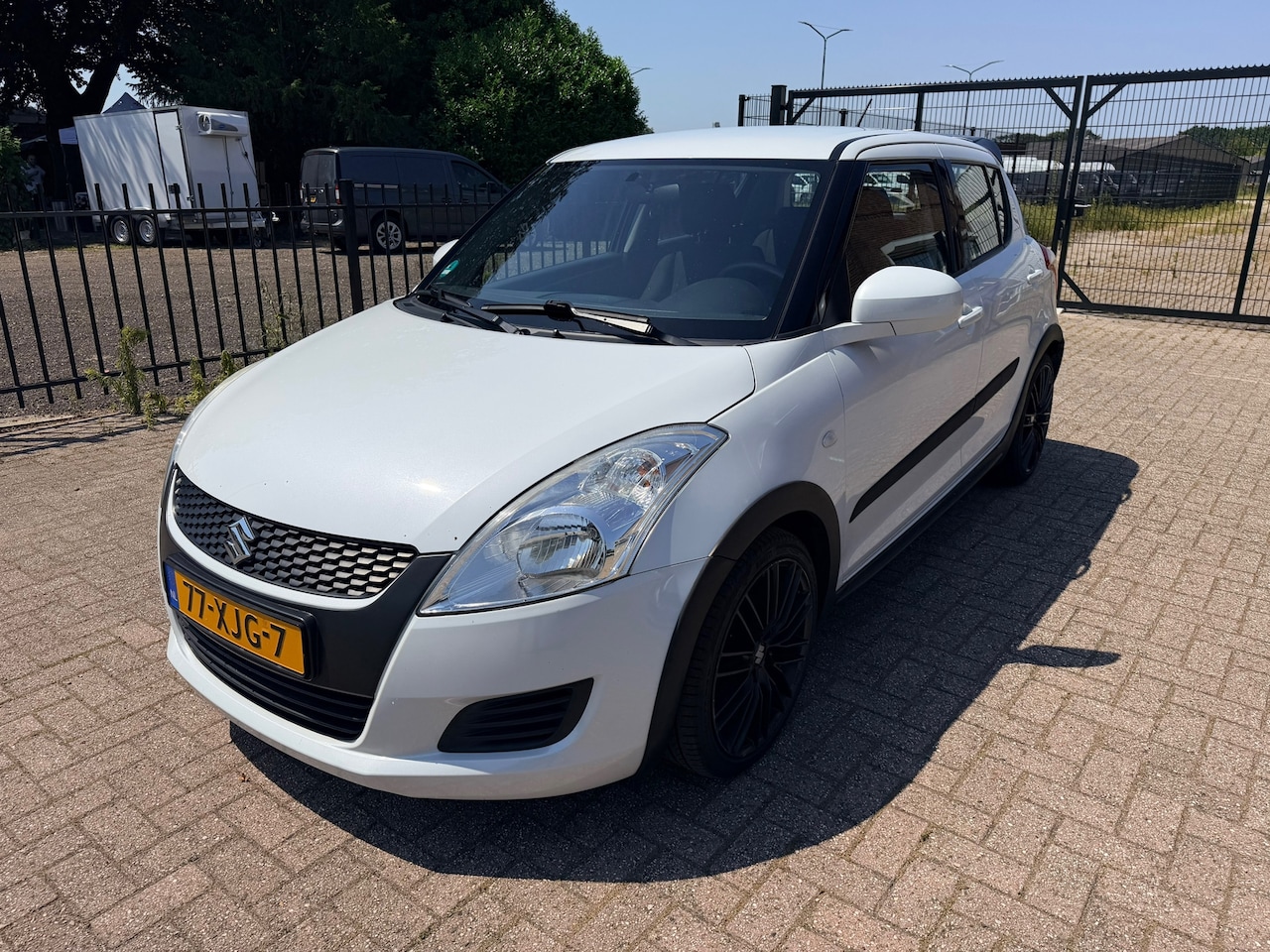 Suzuki Swift - 1.2 Summer EASSS 1.2 Summer EASSS - AutoWereld.nl