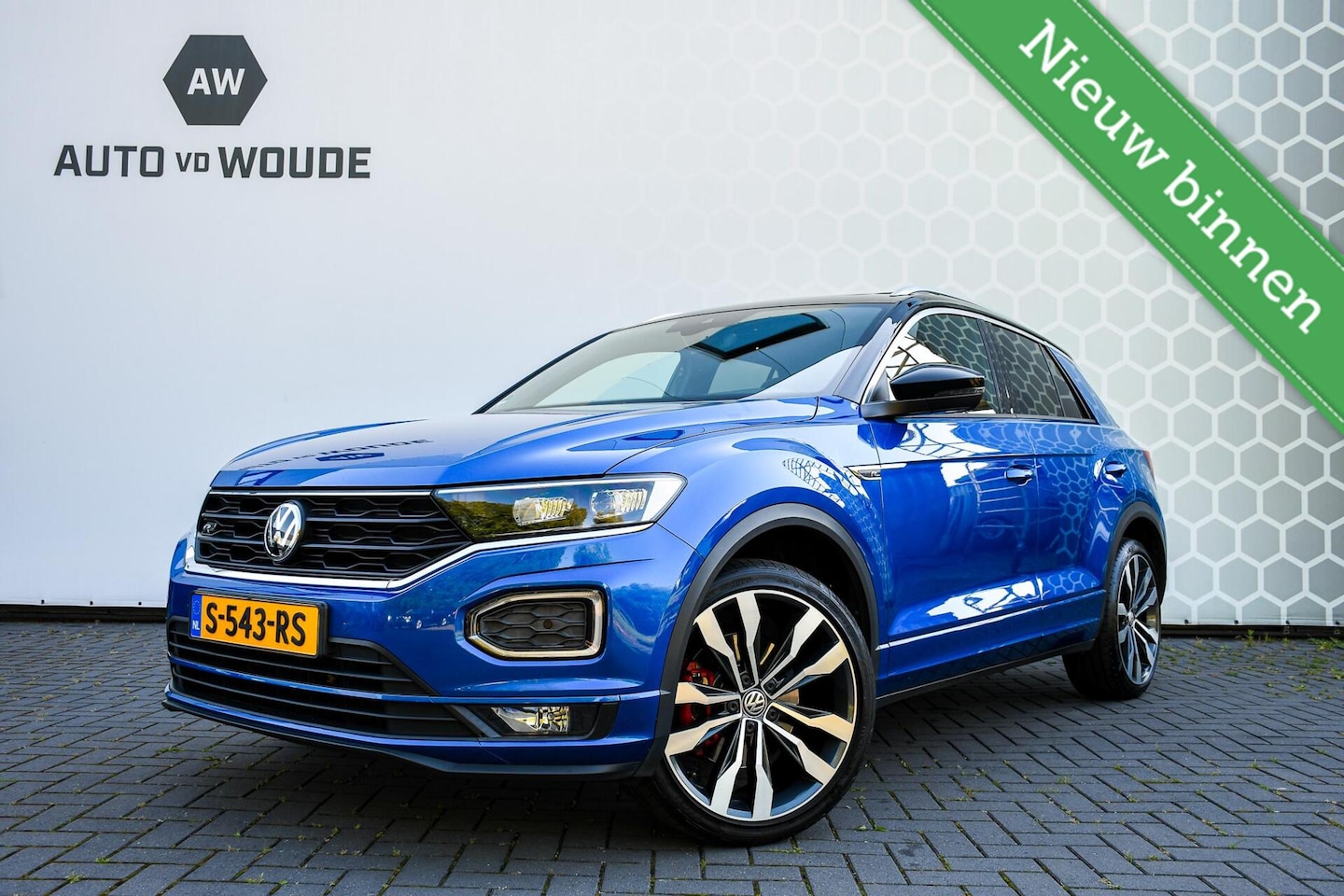 Volkswagen T-Roc - 1.5 TSI Sport Business 3X R-line Pano Virtual Camera - AutoWereld.nl