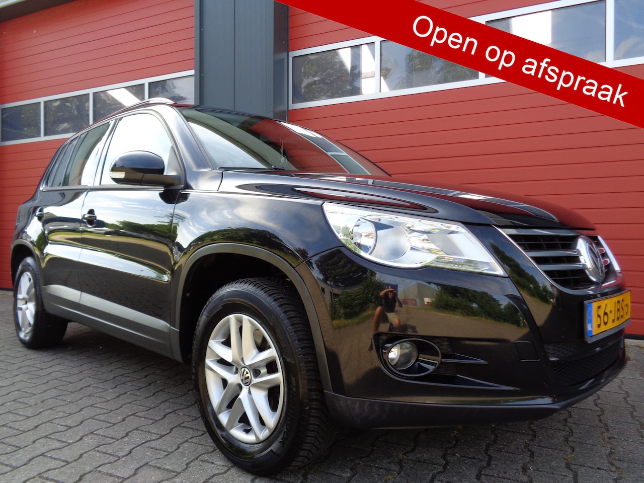 Volkswagen Tiguan - 1.4 TSI Comfort&Design 150PK Clima Cruise LMV 6-BAK NL-Auto 2E-Eigenaar - AutoWereld.nl