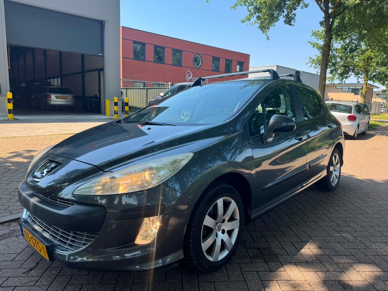 Peugeot 308 - 1.6 VTi XS IJskoude airco dakdragers - AutoWereld.nl