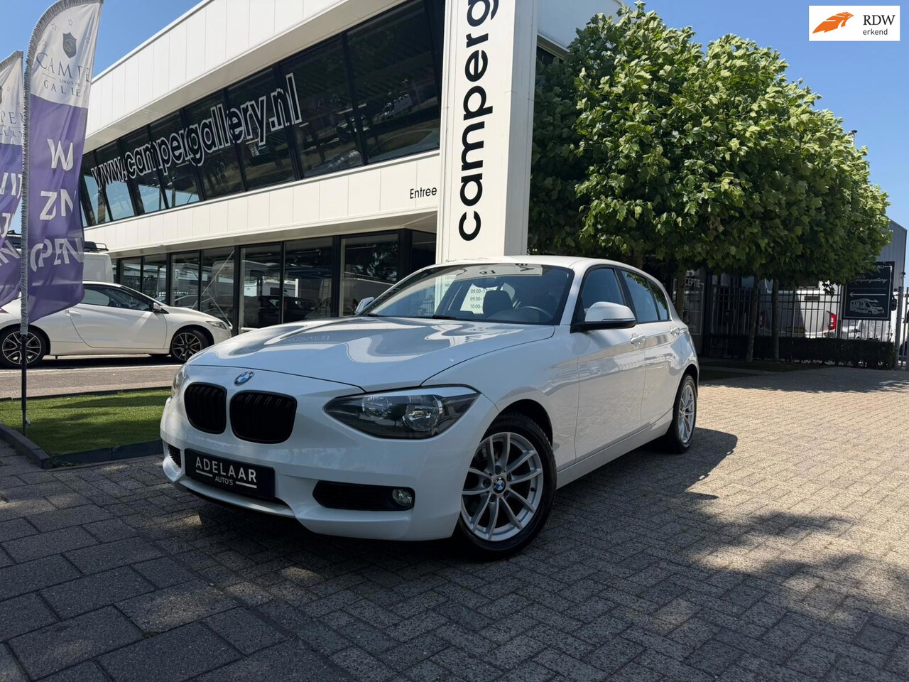 BMW 1-serie - 116i MULTIMEDIA, STOELVERWARMING, PDC - AutoWereld.nl