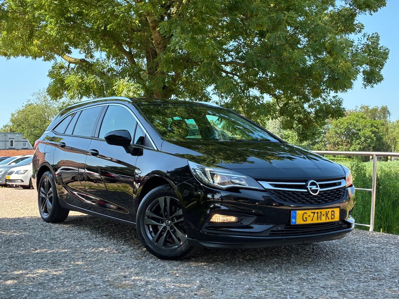 Opel Astra Sports Tourer - 1.0 Turbo 120 Jaar Edition | Navi + Clima + Cruise nu €7.975,-!! - AutoWereld.nl
