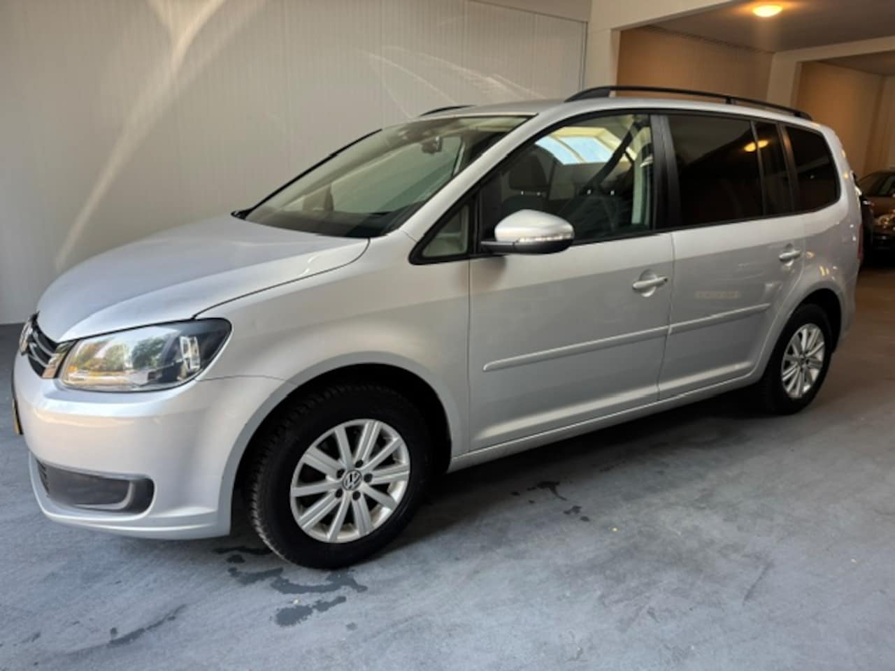 Volkswagen Touran - 1.2 TSI Comfortline BlueMotion 7p. 1.2 TSI Comfortline BlueMotion 7p. - AutoWereld.nl