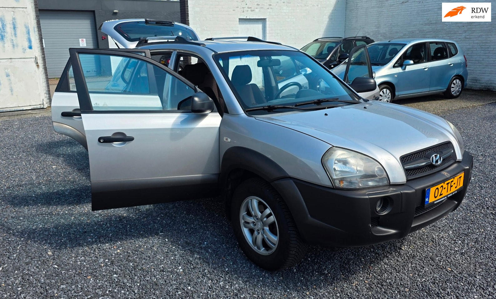 Hyundai Tucson - 2.0i Active Airco Nette auto - AutoWereld.nl