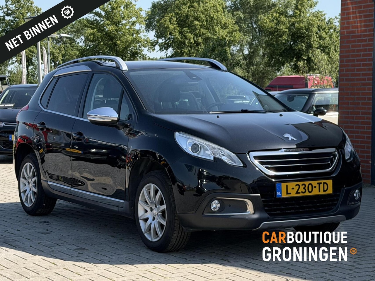 Peugeot 2008 - 1.2 Allure | PANORAMADAK | TREKHAAK | CRUISE - AutoWereld.nl