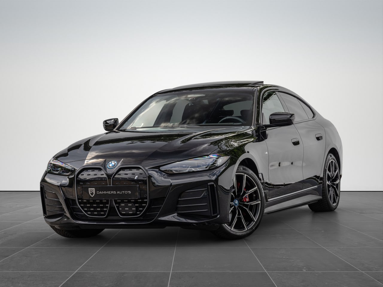 BMW i4 - eDrive40 High Executive 84 kWh M-Pakket M-sportstoelen Schuif/kantel HuD - AutoWereld.nl