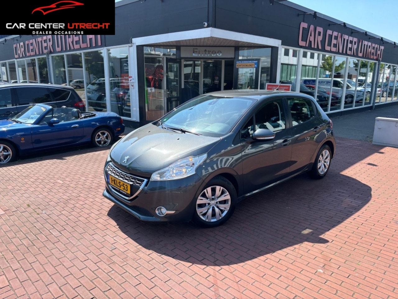 Peugeot 208 - 1.2 VTi Envy navi airco cruise control - AutoWereld.nl