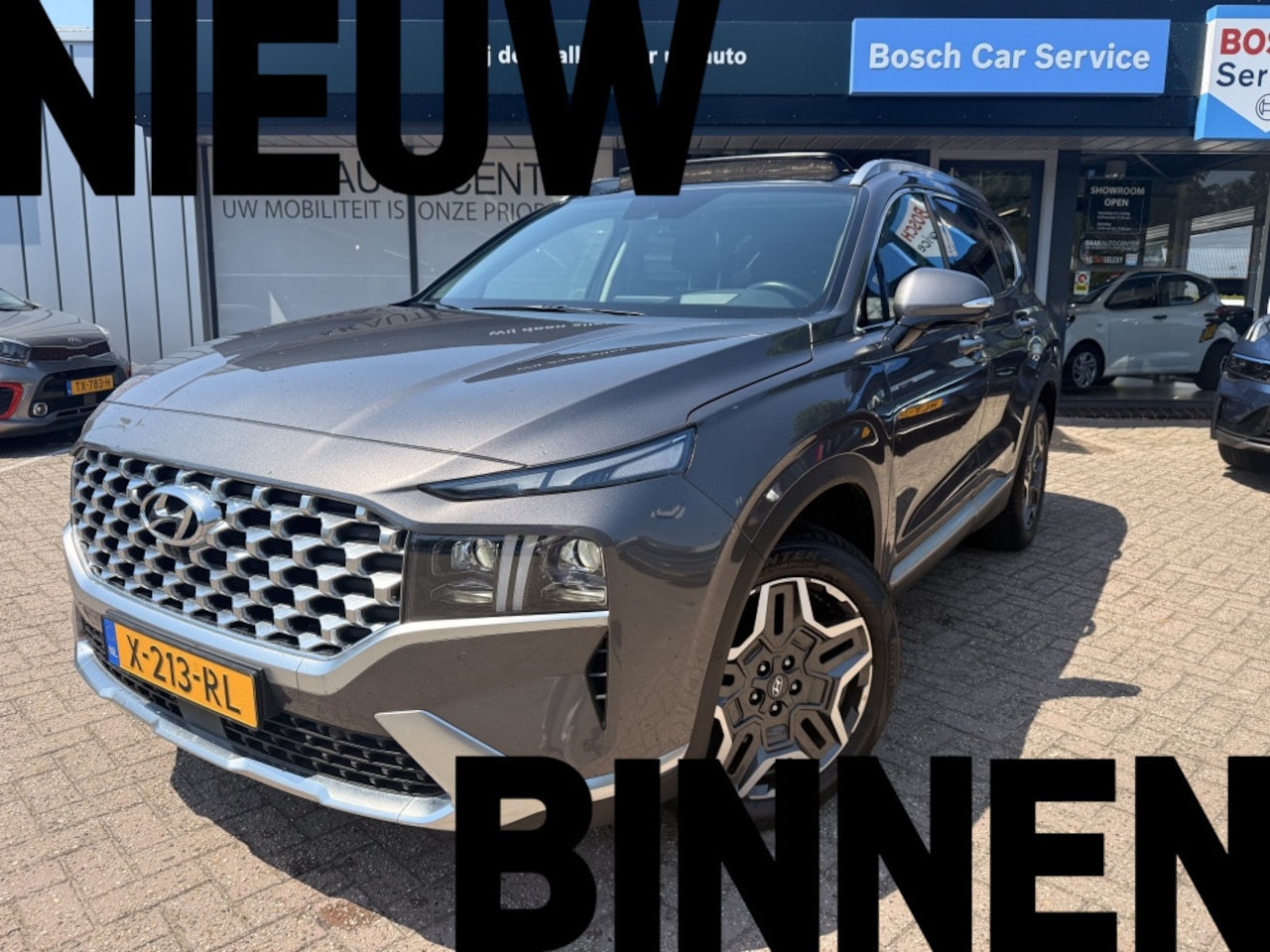 Hyundai Santa Fe - 1.6 T-GDI PHEV Premium Sky 7p. 1.6 T-GDI PHEV Premium Sky 7p | Pano | 360 | Leer - AutoWereld.nl