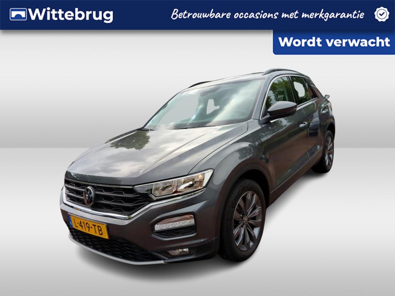 Volkswagen T-Roc - 1.0 TSI Style / PARKEER SENSOREN V+A/ CAMERA/ DIGITAL DASH/ NAVI/ AIRCO - AutoWereld.nl
