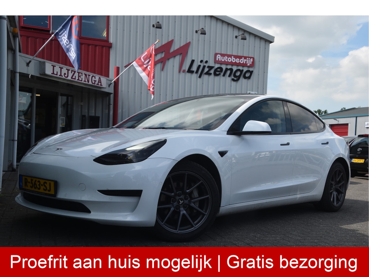 Tesla Model 3 - Standard RWD Plus 60 kWh Leer | Autopilot | Camera | Trekhaak | Pano | 18 inch | Keyless - AutoWereld.nl