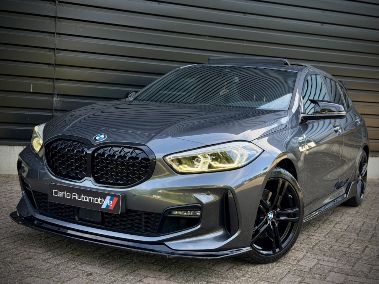 BMW 1-serie - 118i M-PERF. M135 PANO|SCHAALSTOEL|H/K|ACC|CAMERA - AutoWereld.nl