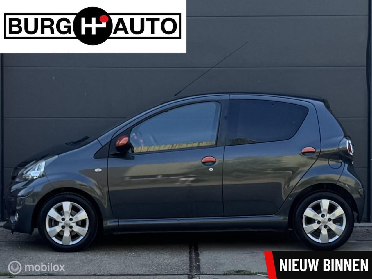Toyota Aygo - 1.0 VVT-i Dynamic Orange 5 deurs - AIRCO - LM VELGEN - EL. RAMEN - BLUETOOTH - CPV - LEDER - AutoWereld.nl