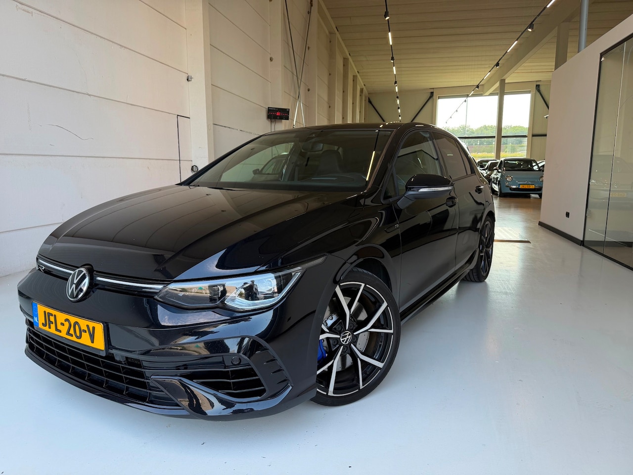 Volkswagen Golf - 2.0 TSI 4Motion R Performance Akrapovich HUD pano DCC - AutoWereld.nl