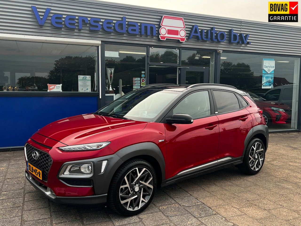 Hyundai Kona - 1.6 GDI HEV Premium Two Tone, Leer, camera, head up display enz... - AutoWereld.nl