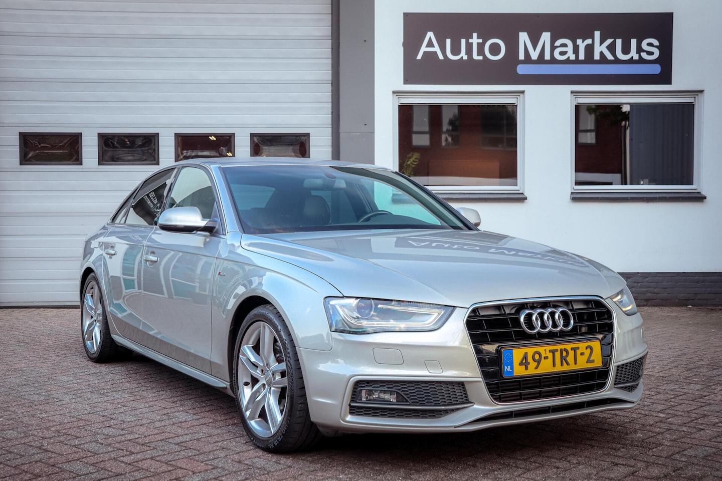 Audi A4 Limousine - 1.8 TFSI 3X S-Line|Aut|Trekhaak|Xenon|Half-Leder - AutoWereld.nl