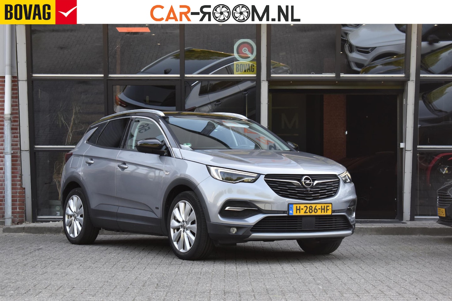 Opel Grandland X - 1.6 Turbo Hybrid4 Innovation Keyless Stoelkoel Camera Lane 4WD - AutoWereld.nl