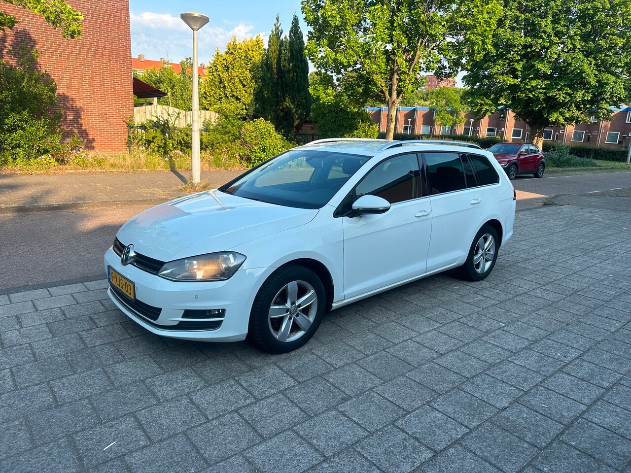Volkswagen Golf Variant - 1.2 TSI Highline Automaat Invalide handpedalen 1-eigenaar - AutoWereld.nl