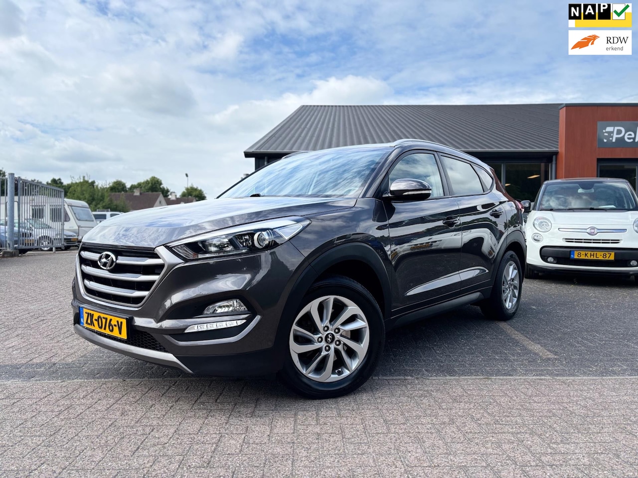 Hyundai Tucson - 1.6 GDi Premium*Navigatie*Pdc*Stoelverwarming*Trekhaak!!! - AutoWereld.nl