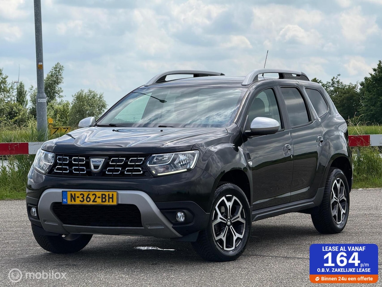 Dacia Duster - 1.0 TCe Bi-Fuel Serie Limitee 15th Anniversary 1.0 TCe Bi-Fuel Serie Limitee 15th Anniversary - AutoWereld.nl