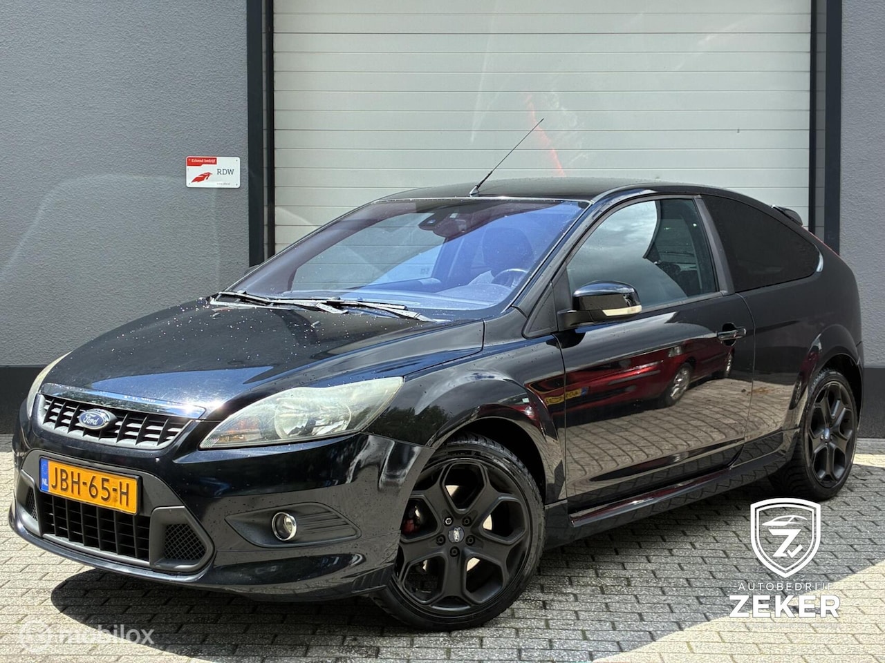 Ford Focus - 2.0 Titanium airco/cruise control/stoelverwarming - AutoWereld.nl