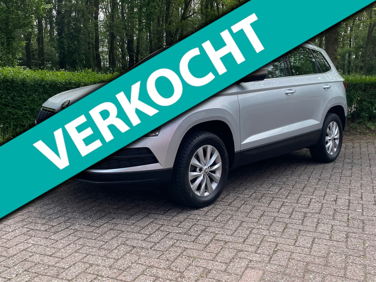 Skoda Karoq - 1.0|TSI|Edition|Navi|Stoelver|Carplay|Keyless|Clima|Camera - AutoWereld.nl