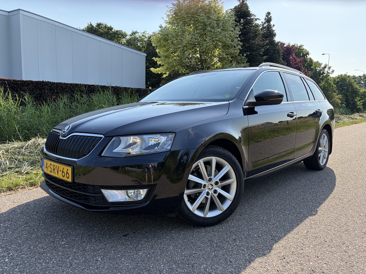Skoda Octavia Combi - 1.2 TSI Greentech Ambition Businessline / NAVI / CRUISE / TREKHAAK / 151dkm! NAP! - AutoWereld.nl