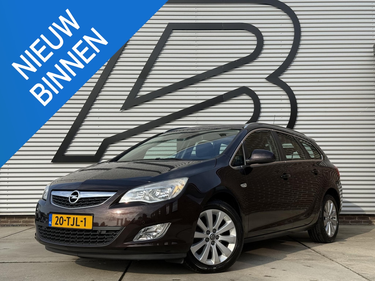 Opel Astra Sports Tourer - 1.4 Turbo Cosmo 2e Eigenaar|Clima|Trekhaak|PDC V+A|Cruise|N.A.P|APK tot 05-2027 - AutoWereld.nl