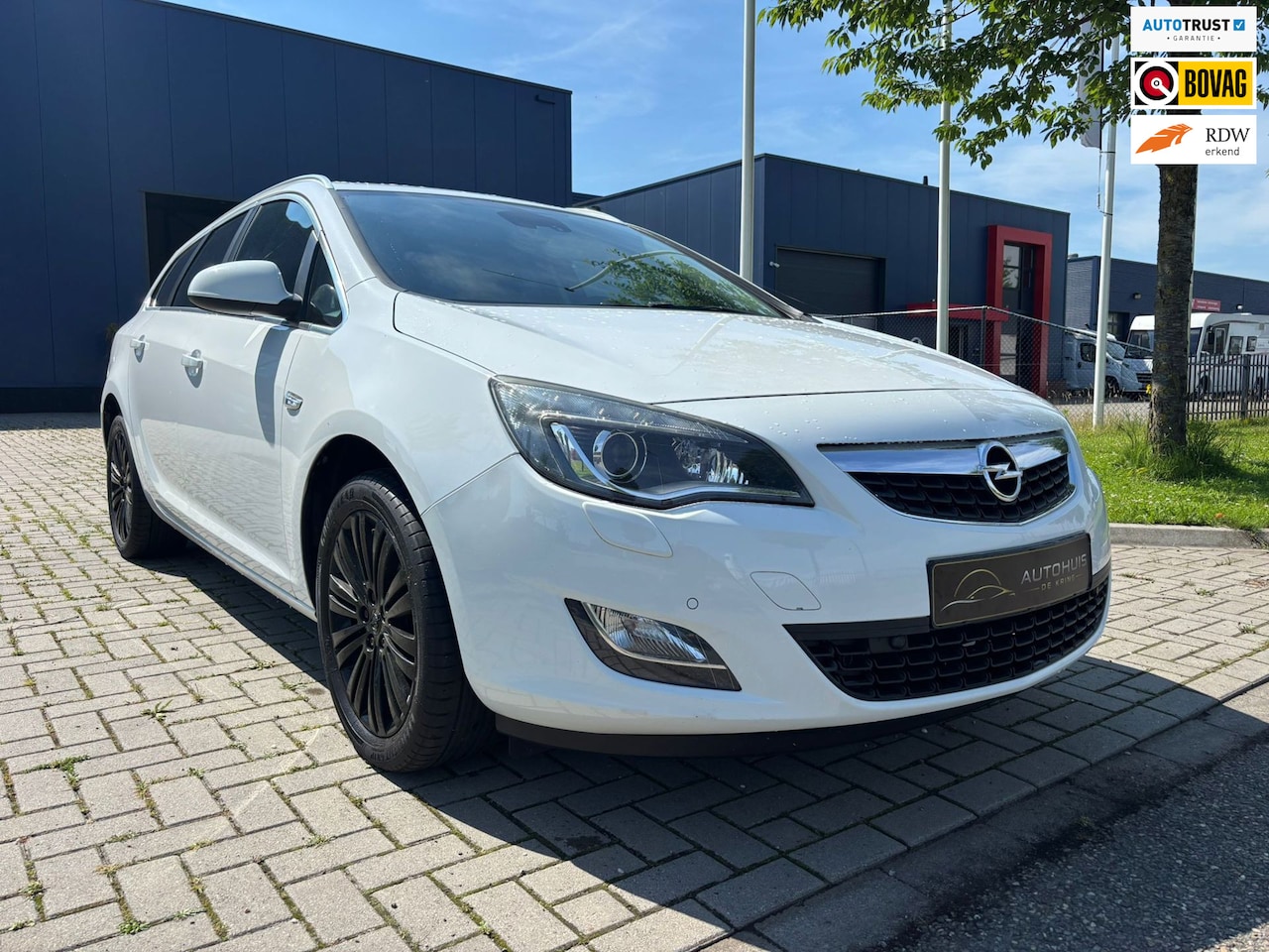 Opel Astra Sports Tourer - 1.4 Turbo Cosmo / CRUISE CONTROL / PDC / CLIMATE CONTROL / LEDER / STOELVERWARMING - AutoWereld.nl
