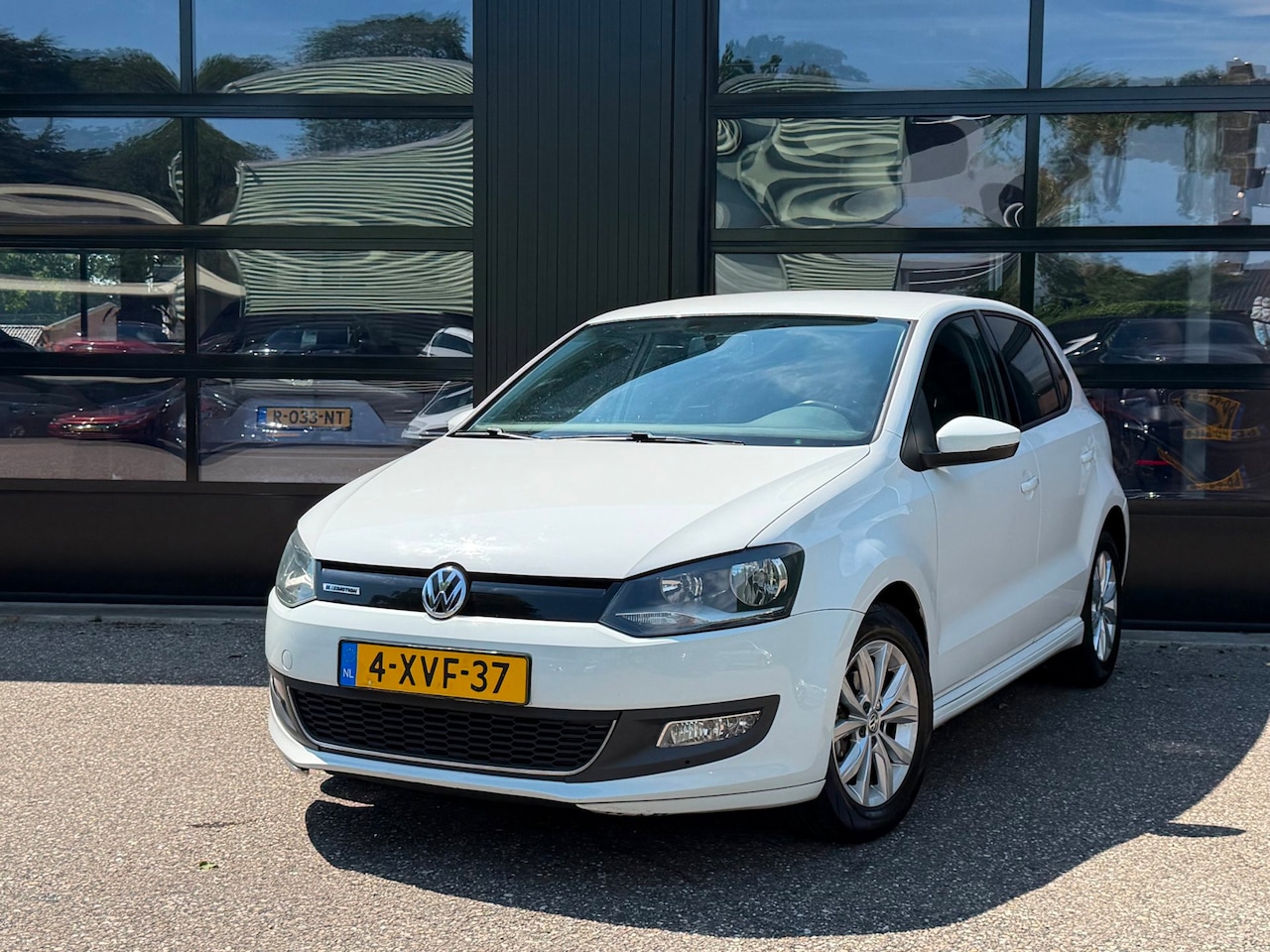 Volkswagen Polo - 1.4 TDI BlueMotion Navi Cruise Bluetooth - AutoWereld.nl